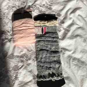 Leg warmers, two pairs, a blush pink and a gray.